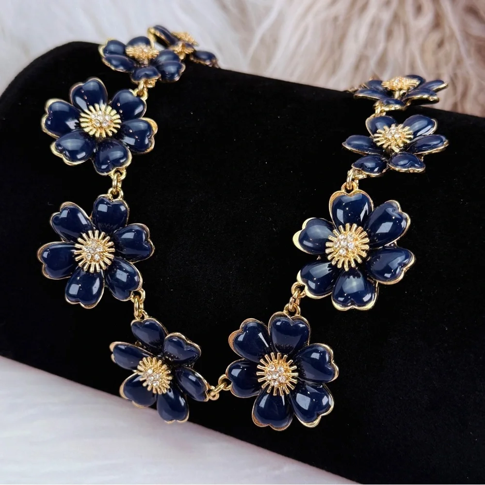 Beautiful, vintage goldtone, blue enamel, clear, bling weighted necklace
